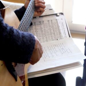 Music Therapist Guitar and Sheet Music Music Therapist Guitar and Sheet Music