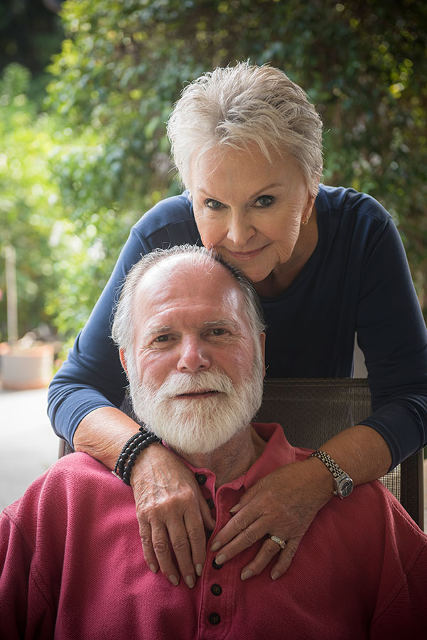 elderly couple smiling