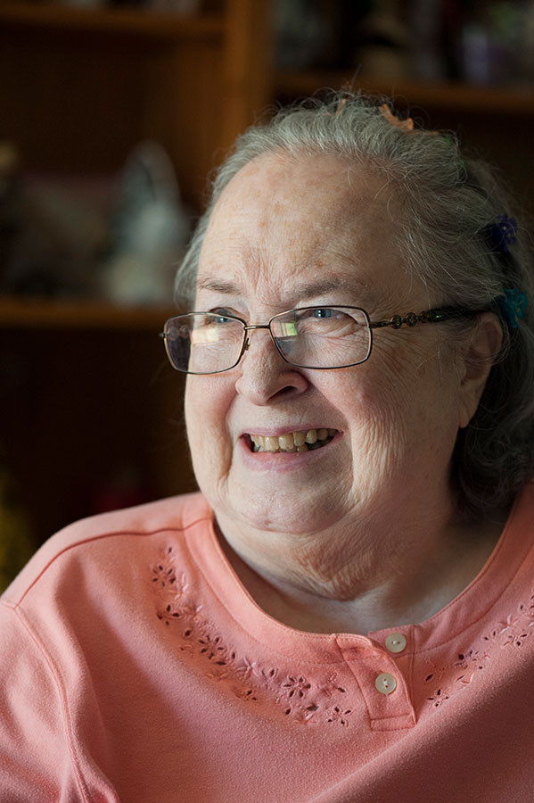 closeup of person sitting and smiling