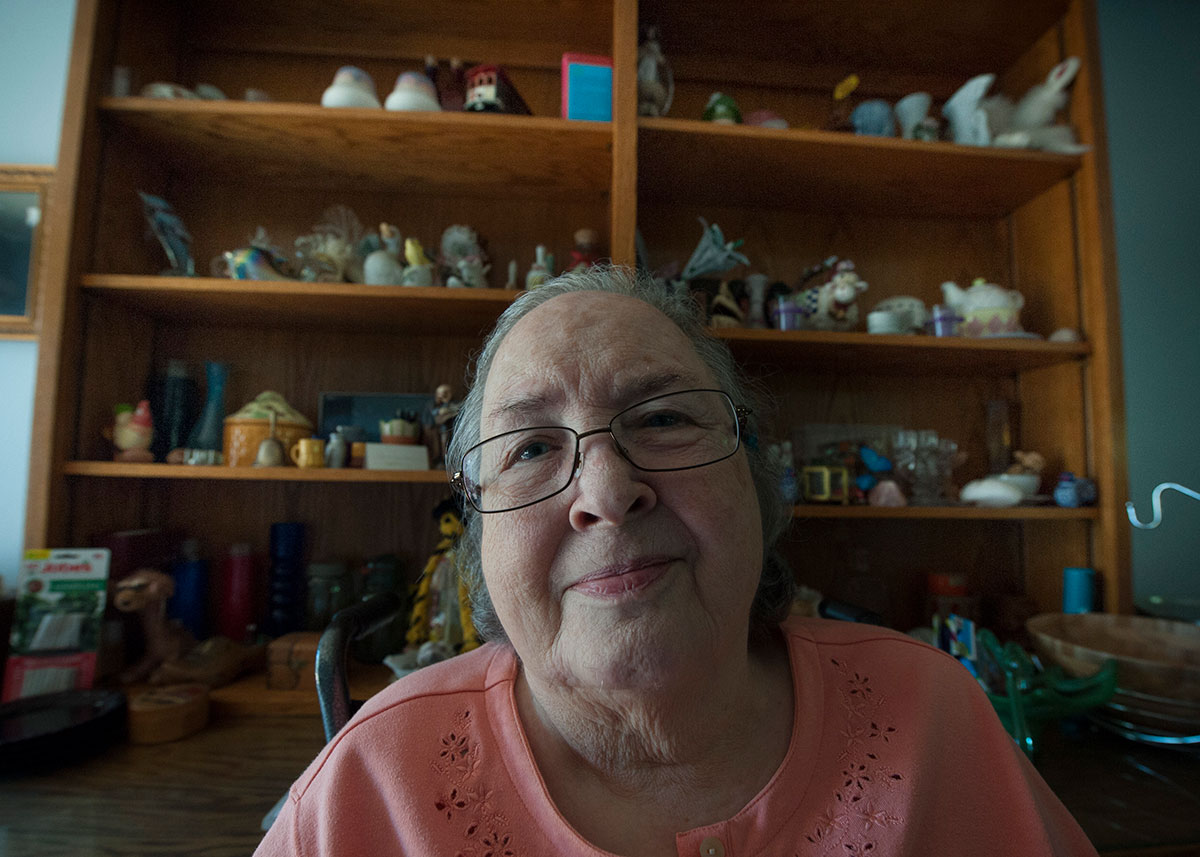 person sitting and smiling