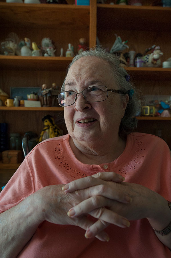person sitting and smiling