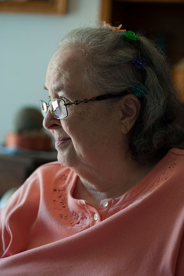 closeup of person sitting and smiling