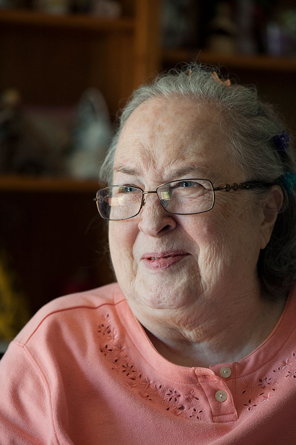 closeup of person sitting and smiling