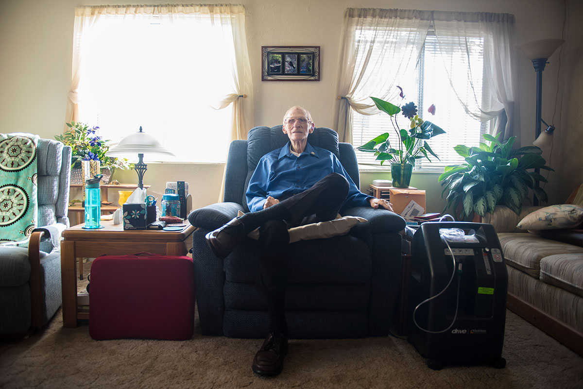 elderly person sitting in a living room