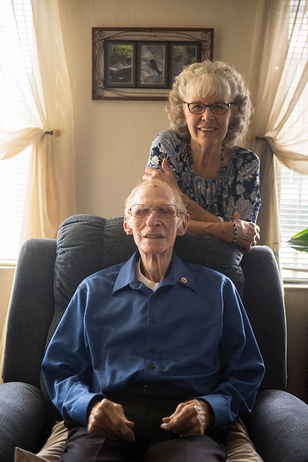 elderly couple inside their house