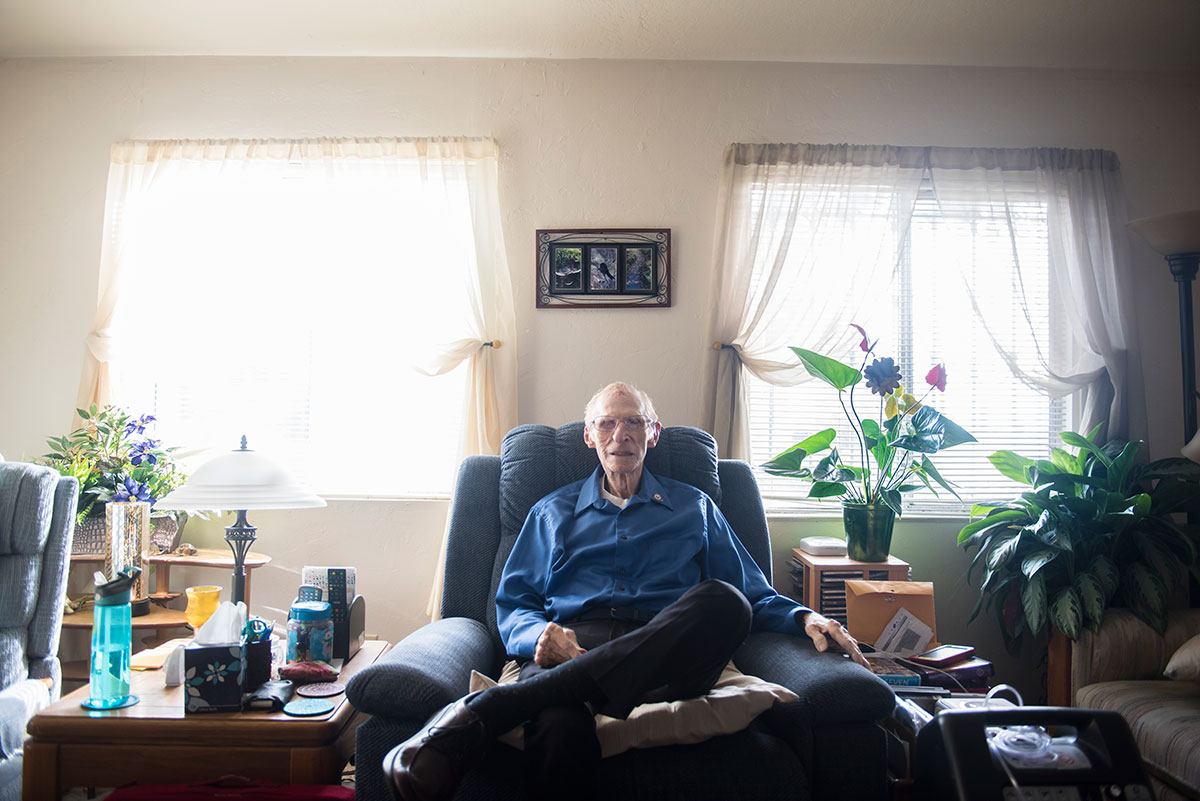 elderly person sitting in a living room