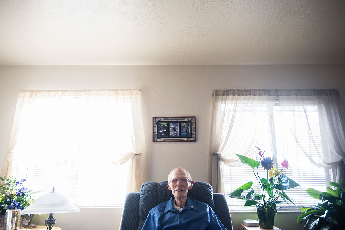 elderly person sitting in a living room