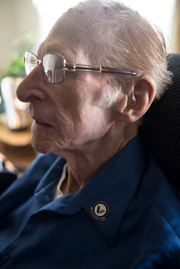 closeup of elderly person sitting